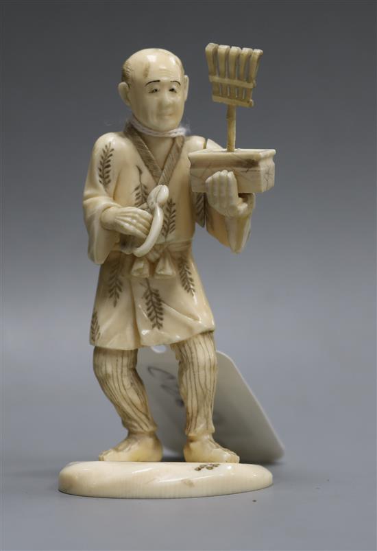 A Japanese sectional ivory figure height 10cm